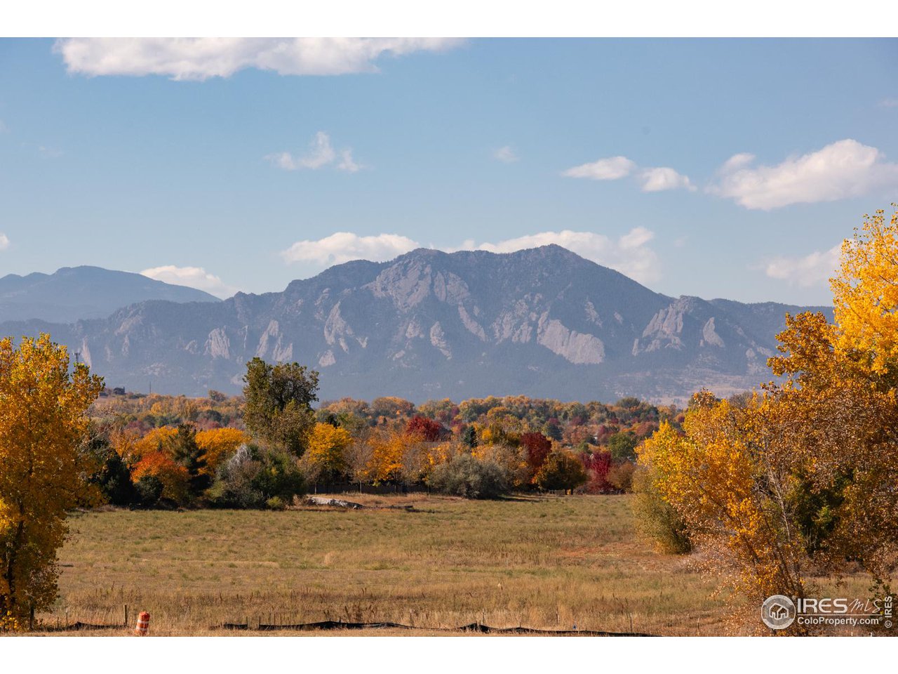 909 Latigo Loop Lafayette, CO 80026 - Photo 12 of 16 a view of mountain and sunset