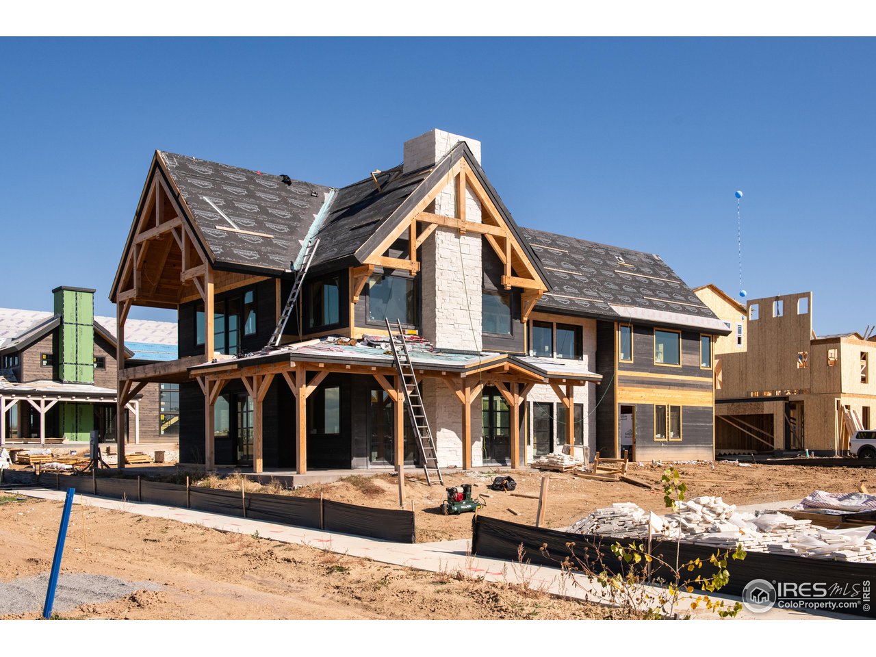 909 Latigo Loop Lafayette, CO 80026 - Photo 7 of 16 a front view of residential houses