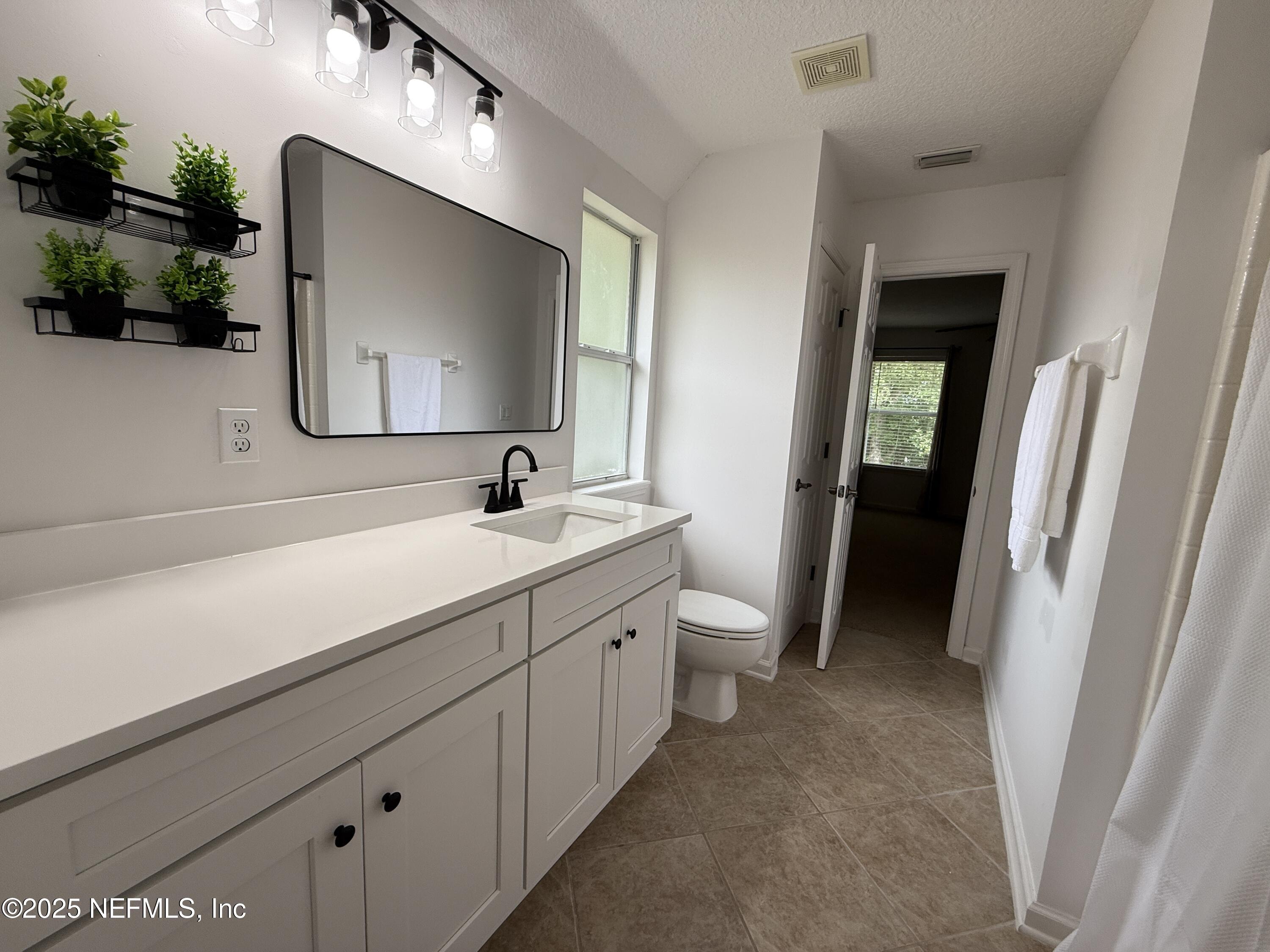 1010 Garrison Drive St. Augustine, FL 32092 - Photo 31 of 40 Connected Bath Upstairs