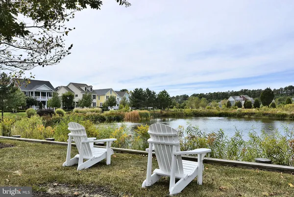 a view of a lake with a bench