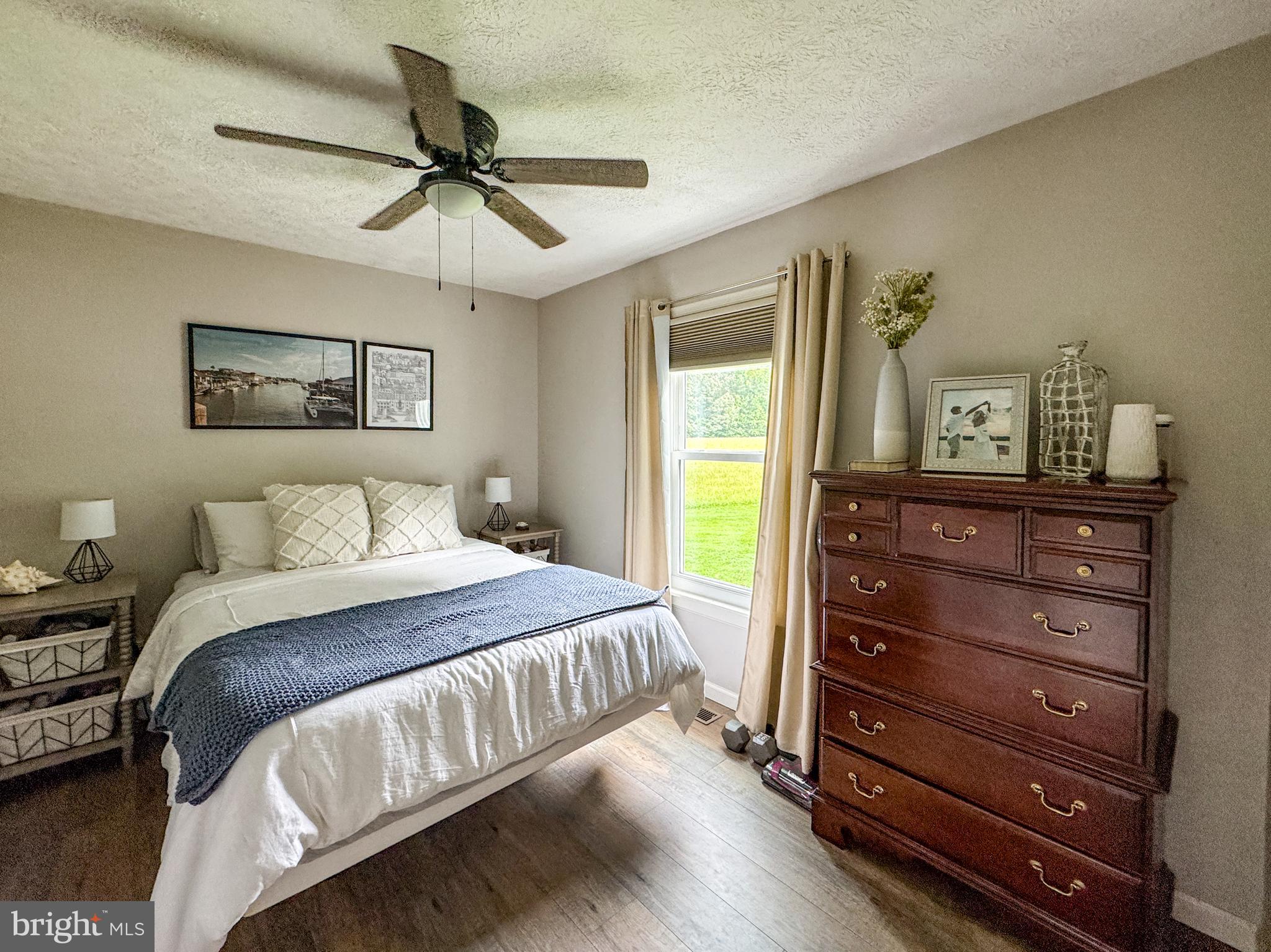 3843 Buckner Road Mineral, VA 23117 - Photo 15 of 26 a bedroom with a bed and a dresser