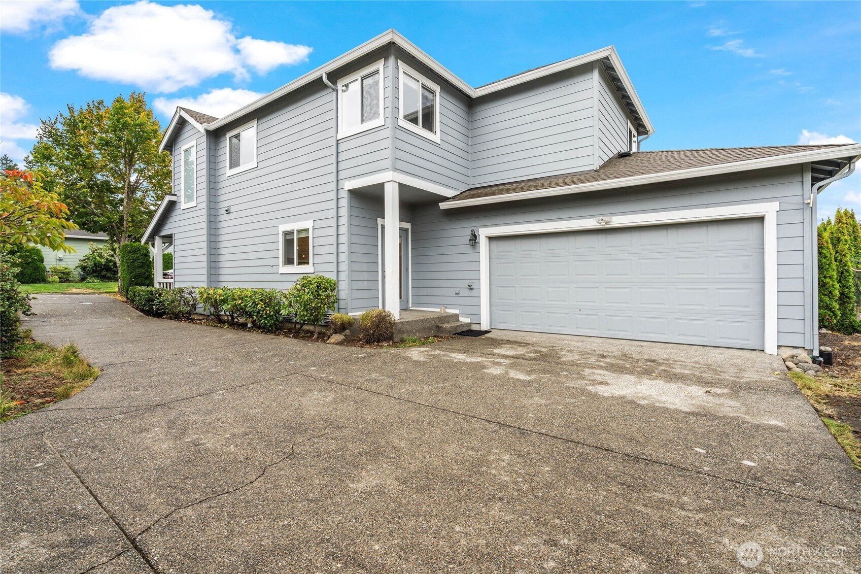 16919 165th Place Southeast Renton, WA 98058 - Photo 14 of 29 a view of backyard of house and garage