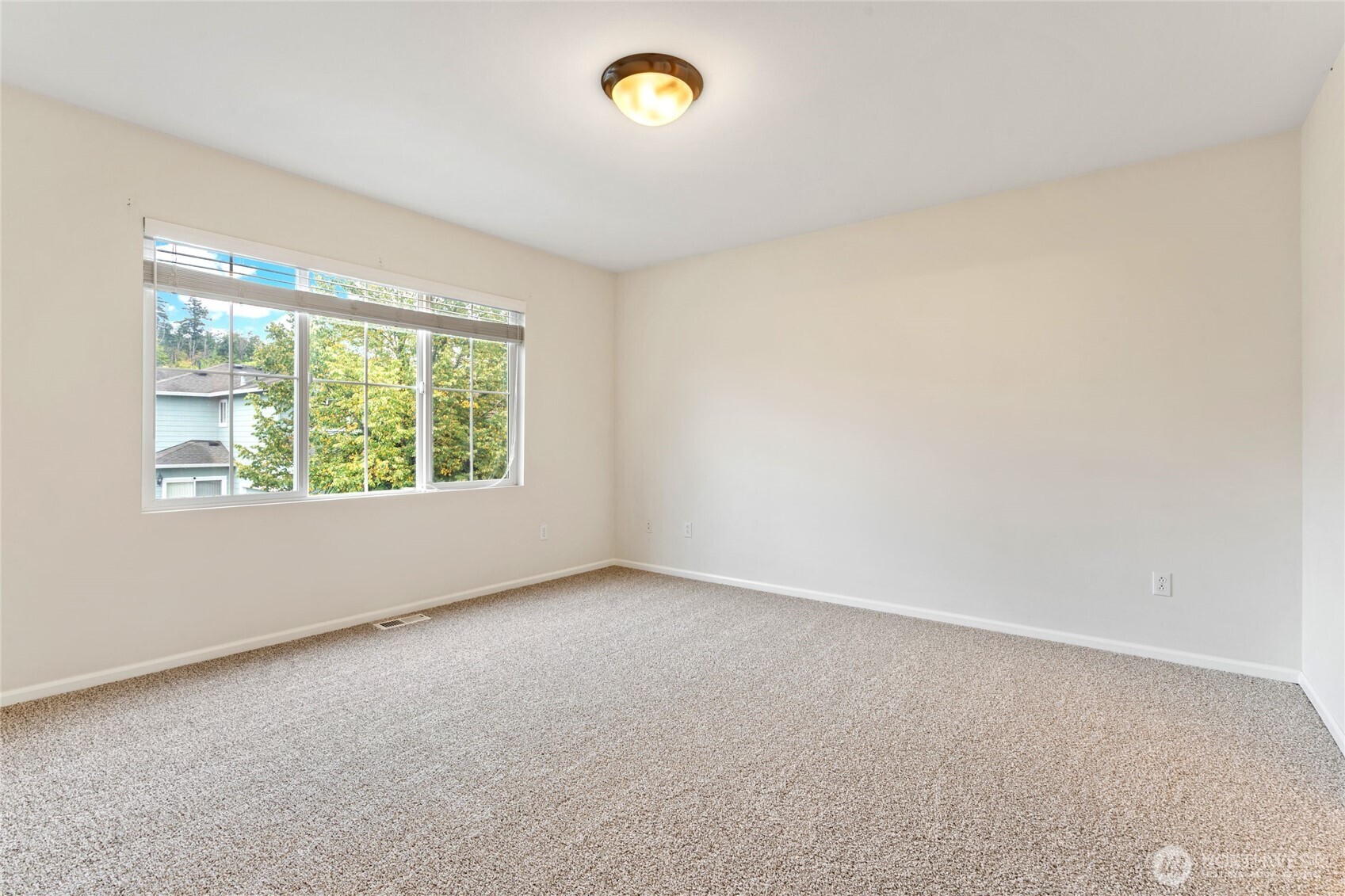 16919 165th Place Southeast Renton, WA 98058 - Photo 16 of 29 an empty room with a window