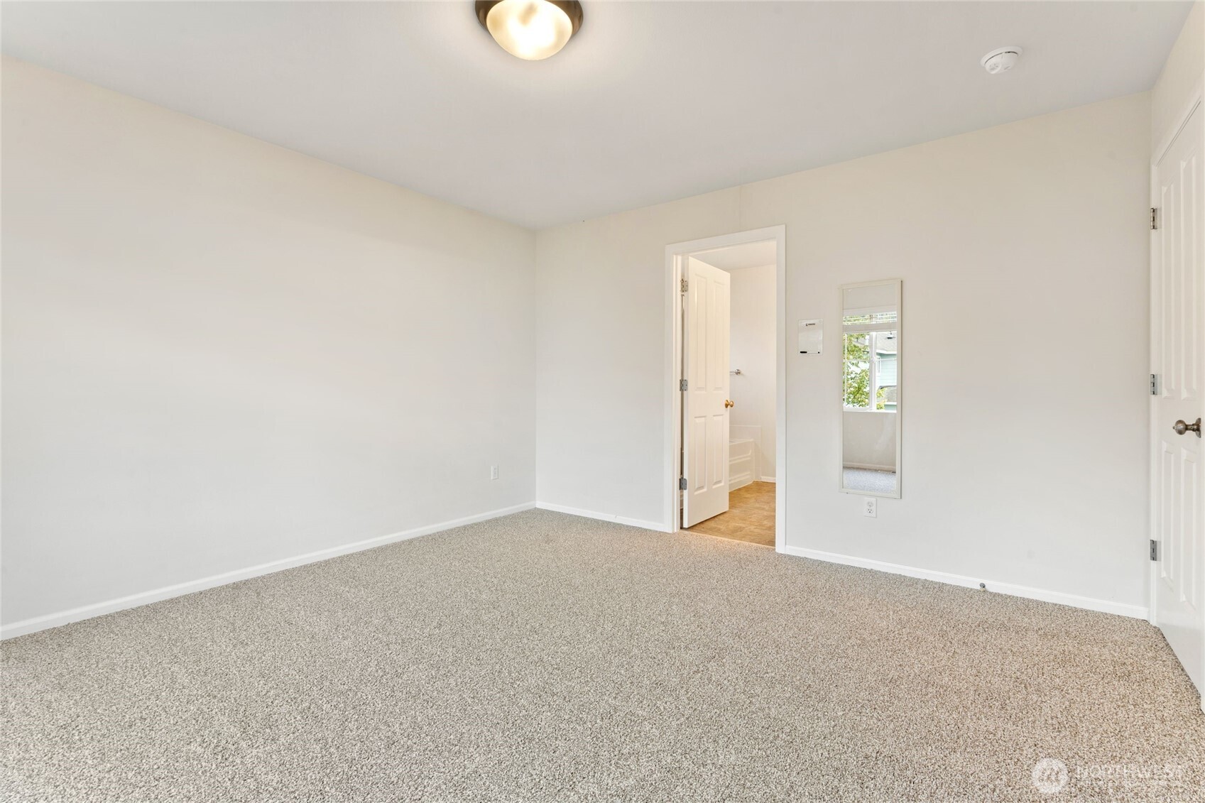 16919 165th Place Southeast Renton, WA 98058 - Photo 17 of 29 an empty room with windows