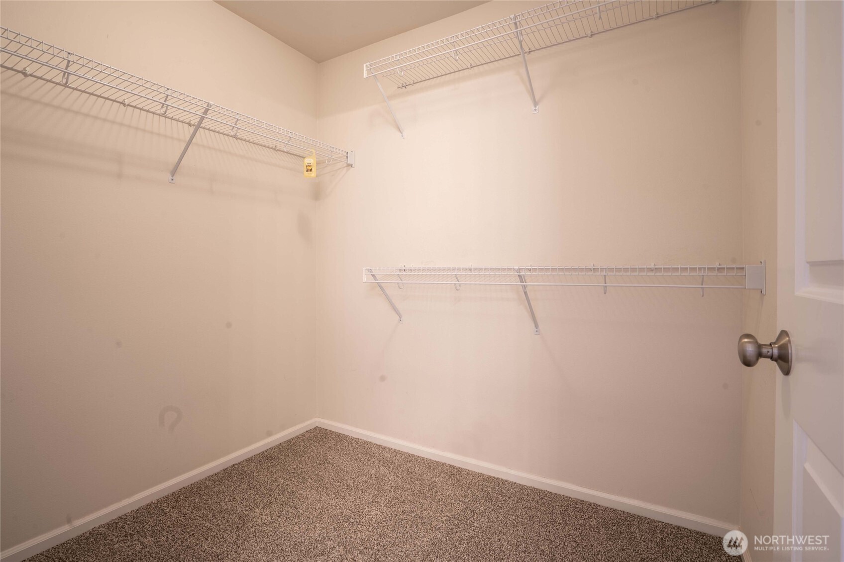 16919 165th Place Southeast Renton, WA 98058 - Photo 20 of 29 a view of a room with racks on the wall
