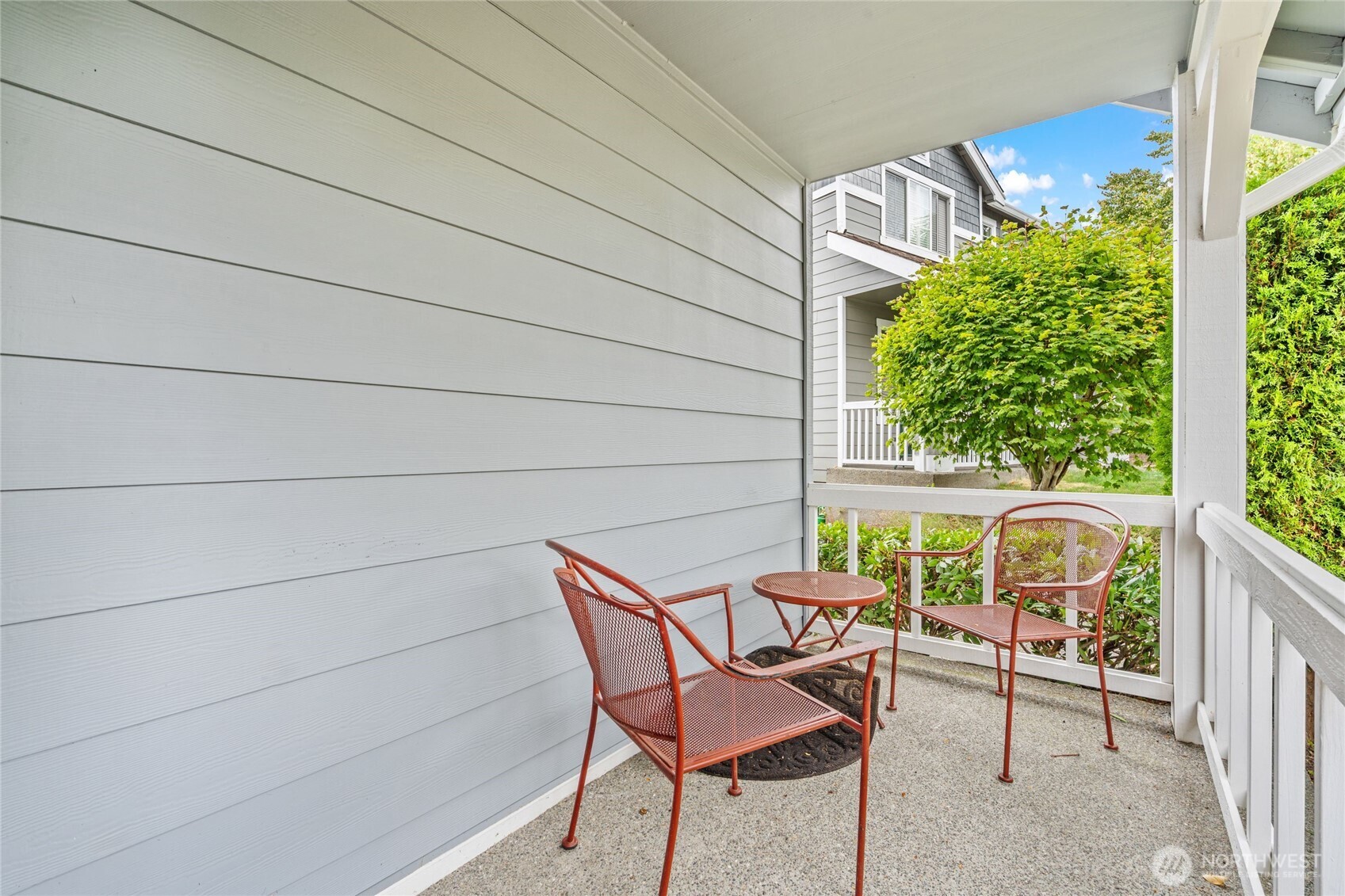 16919 165th Place Southeast Renton, WA 98058 - Photo 3 of 29 a view of chair and table in the balcony
