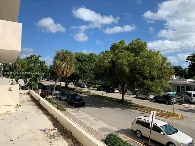 a view of a patio with swimming pool