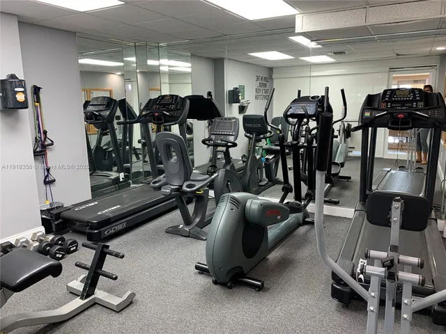 a outdoor view of a building with cars parked