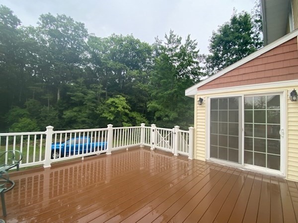 219 Clark Street Gardner, MA 01440 - Photo 4 of 29 a view of balcony with deck and wooden floor