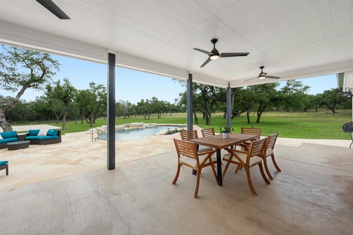 333 Stallion Lane Dripping Springs, TX 78620 - Photo 28 of 40 a view of a patio with a backyard