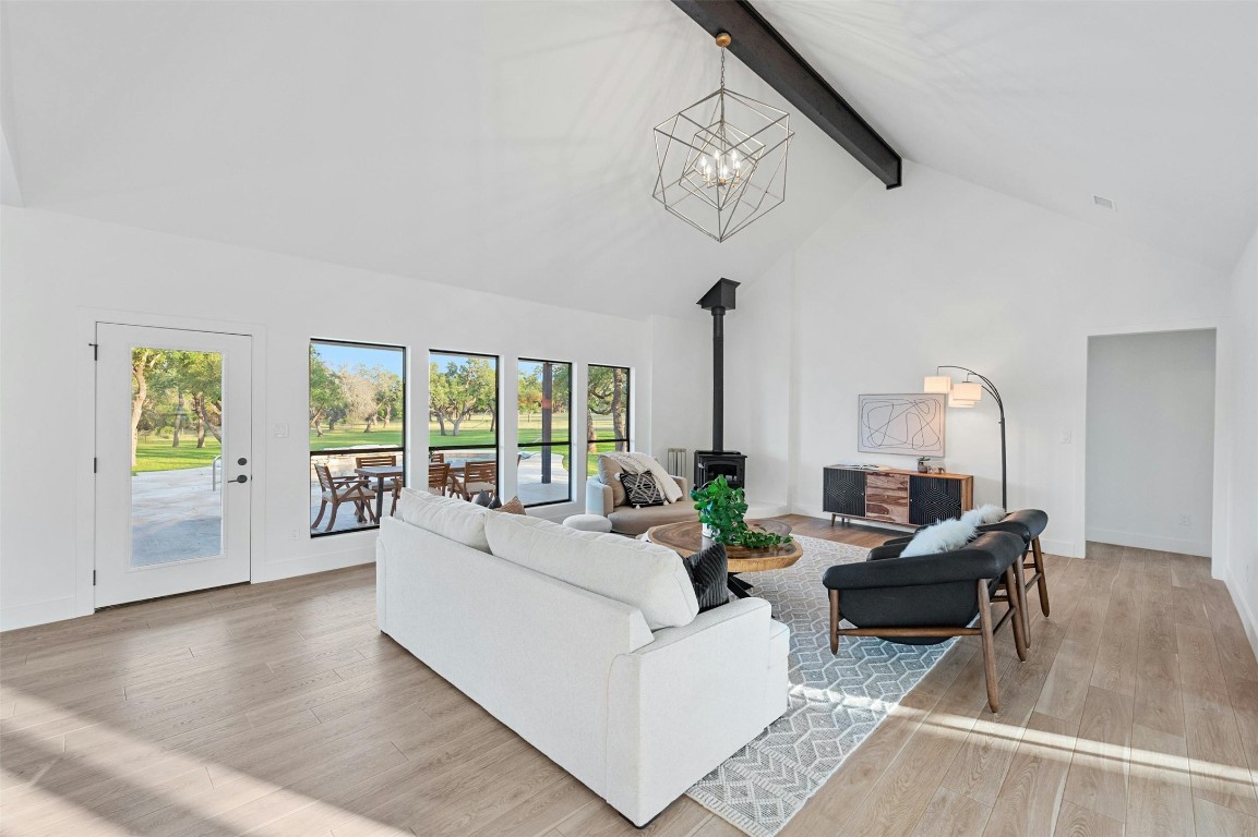 333 Stallion Lane Dripping Springs, TX 78620 - Photo 7 of 40 a living room with furniture and a large window