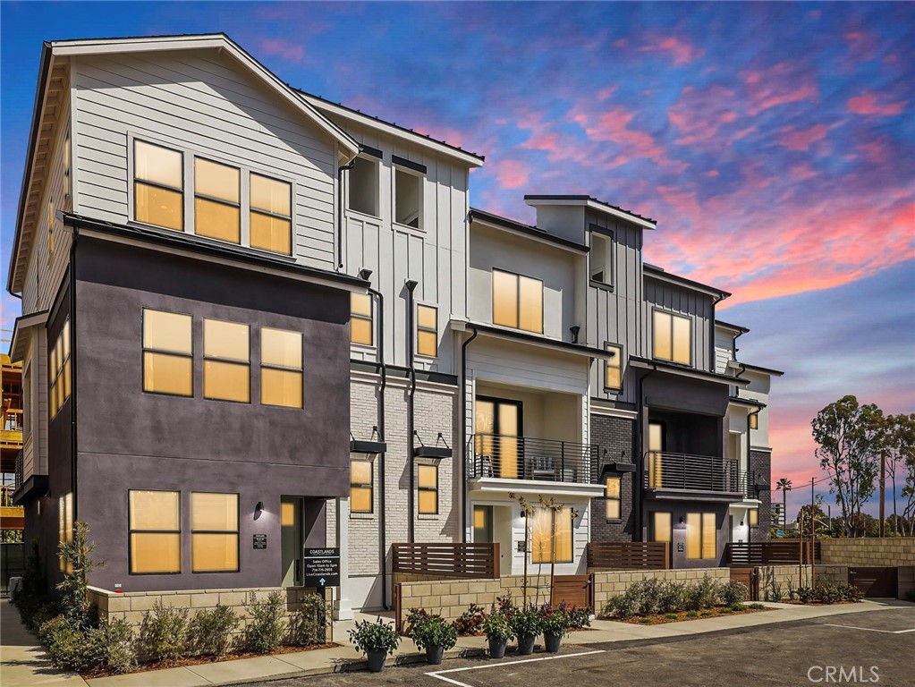 a front view of a multi story residential apartment building