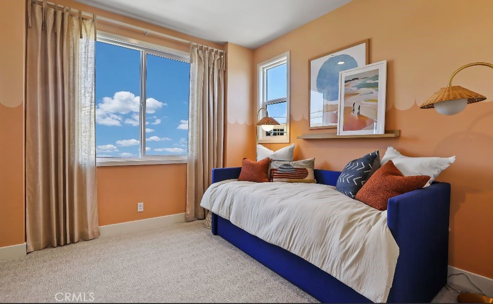 19071 Main Street, Unit 105 Huntington Beach, CA 92648 - Photo 18 of 18 a bed room with a bed and a window