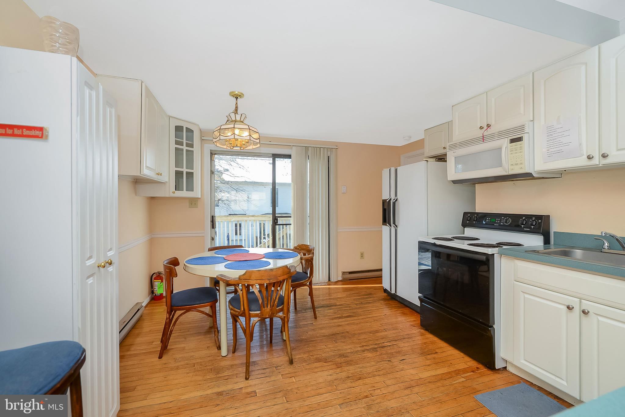 14013 North Ocean Road Ocean City, MD 21842 - Photo 23 of 35 DINE-IN KITCHEN to DECK
