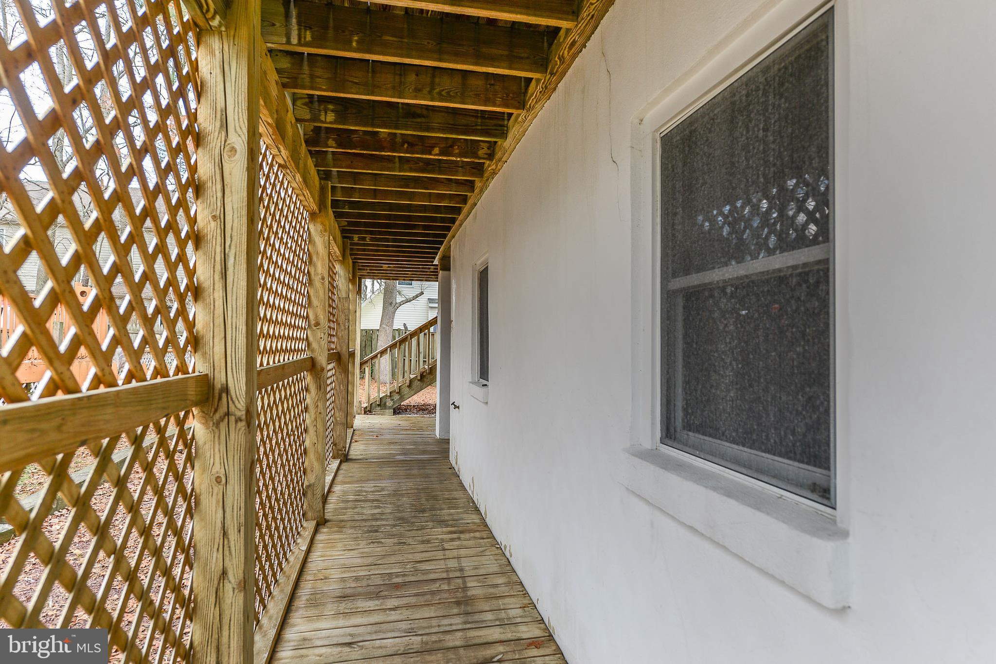 14013 North Ocean Road Ocean City, MD 21842 - Photo 7 of 35 SOUTH SIDE ENTRY