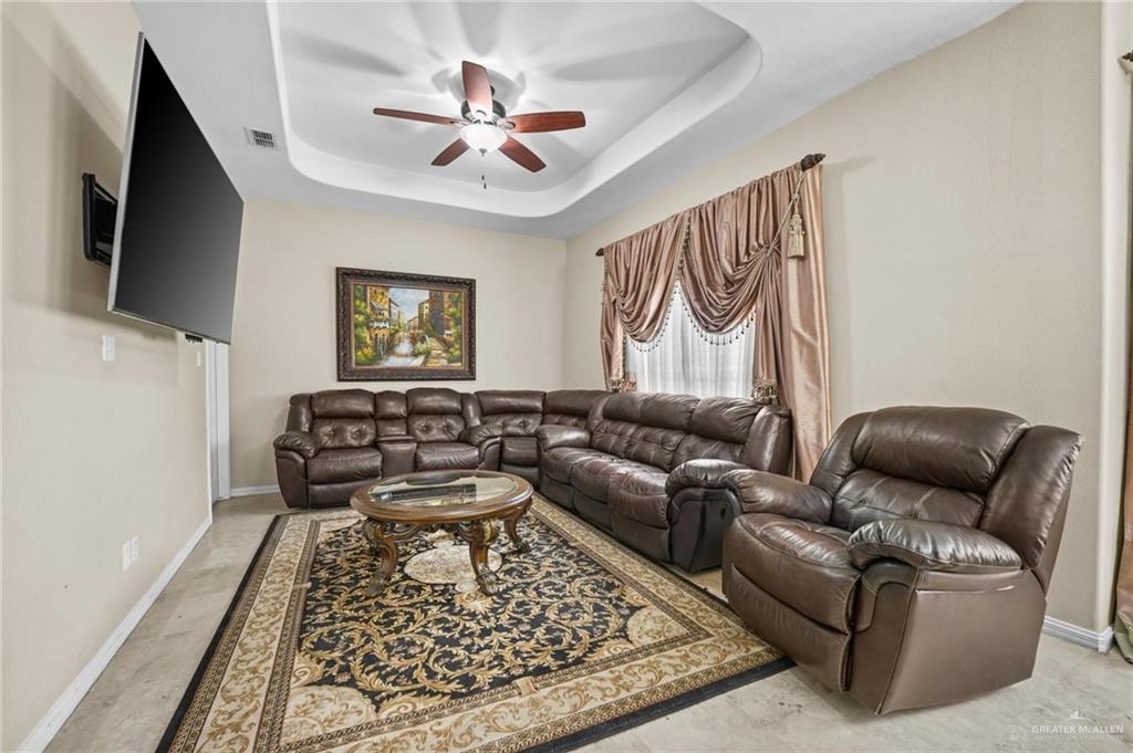 2809 Santa Laura Street Mission, TX 78572 - Photo 22 of 41 a living room with furniture and a rug