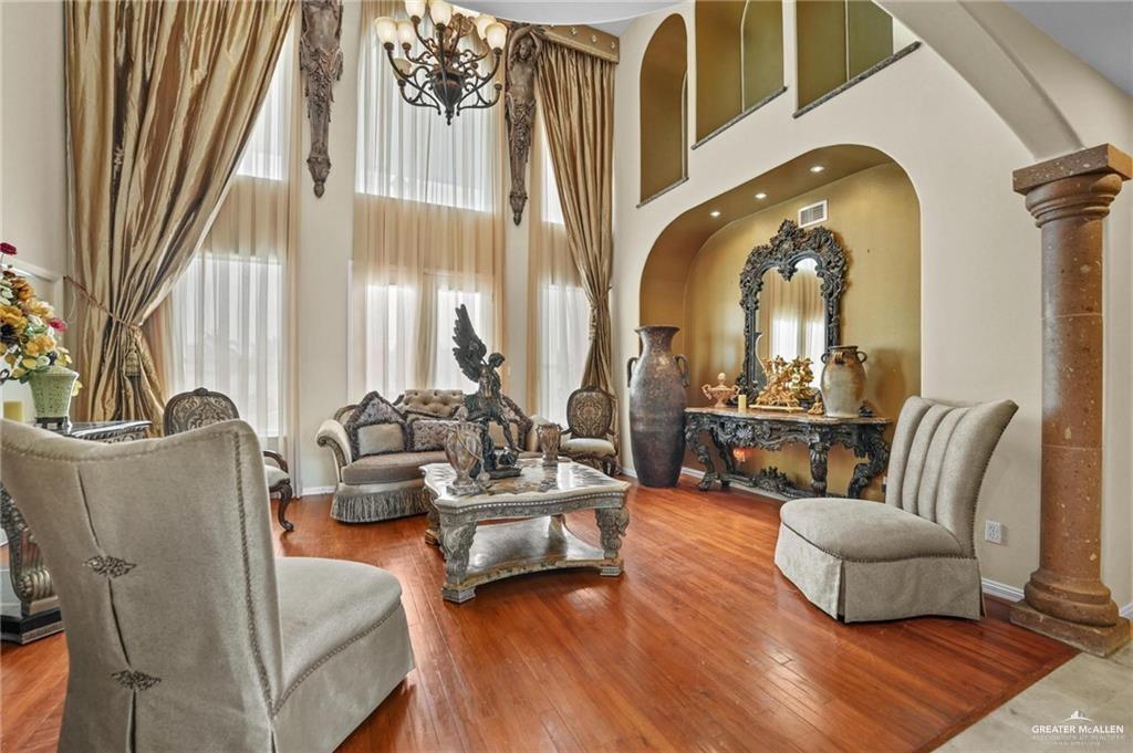 2809 Santa Laura Street Mission, TX 78572 - Photo 8 of 41 a living room with furniture and a fireplace
