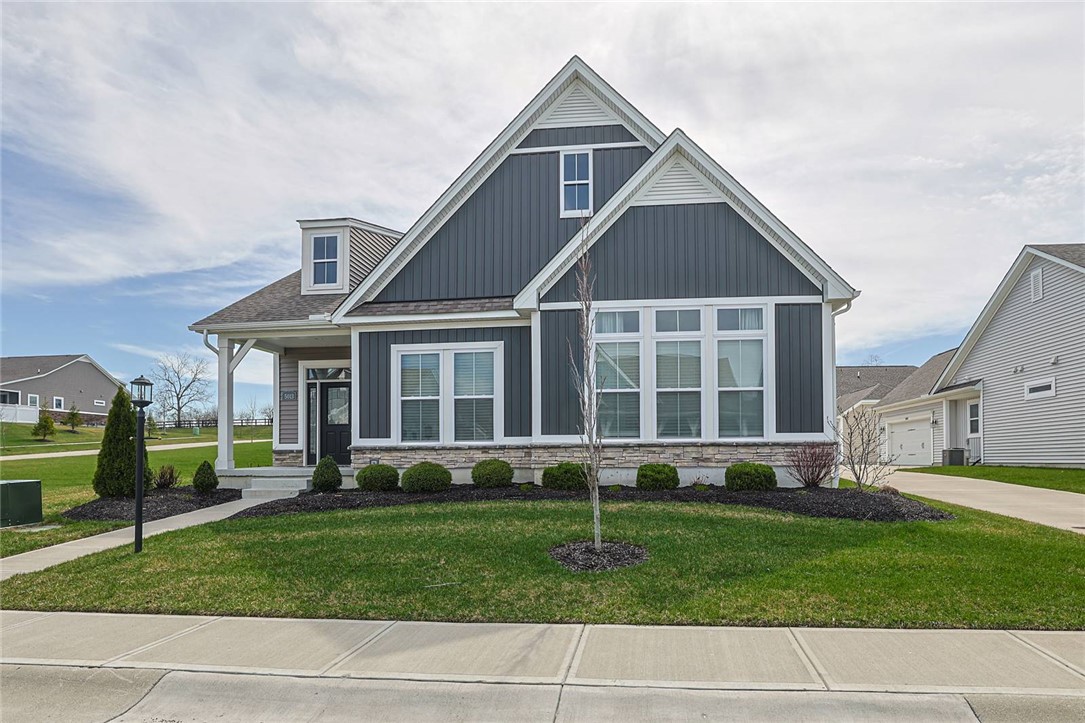 5013 Arena Court Hamilton, OH 45011 - Photo 40 of 41 This charming home offers a spacious front yard and a welcoming entrance.