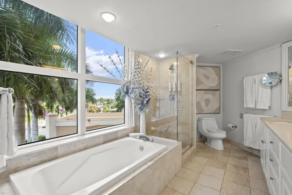 a bath tub sitting next to a window