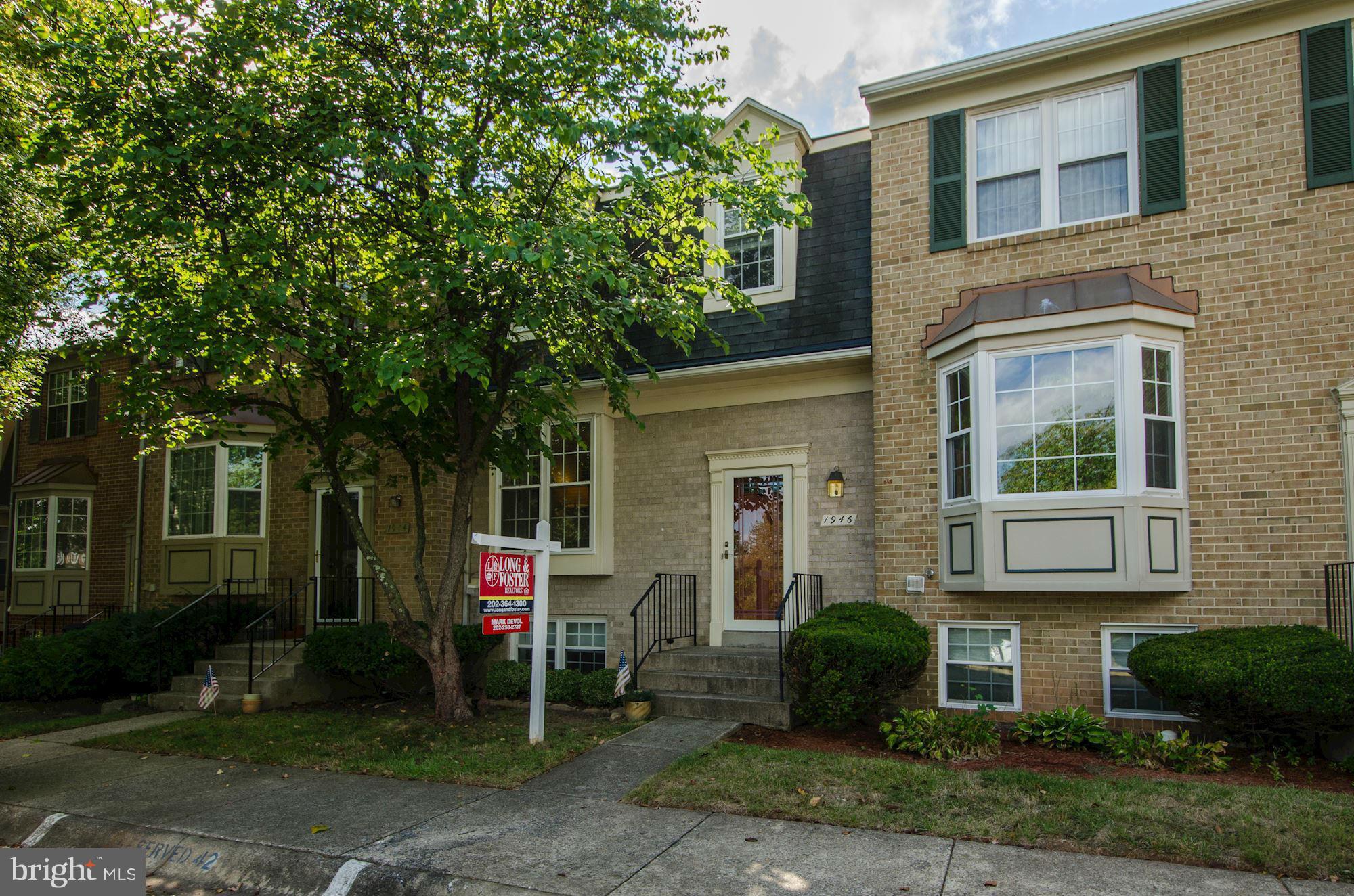1946 Flowering Tree Terrace Silver Spring, MD 20902 - Photo 1 of 30 Front Exterior with adjoining 2 car Reserved Pkg