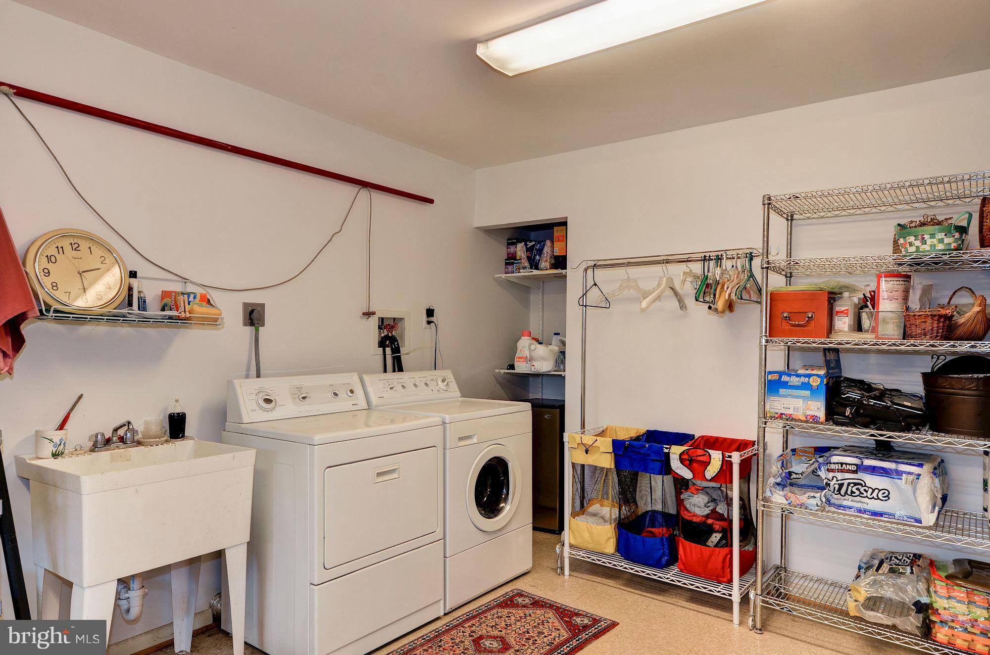 1946 Flowering Tree Terrace Silver Spring, MD 20902 - Photo 24 of 30 Laundry and Storage