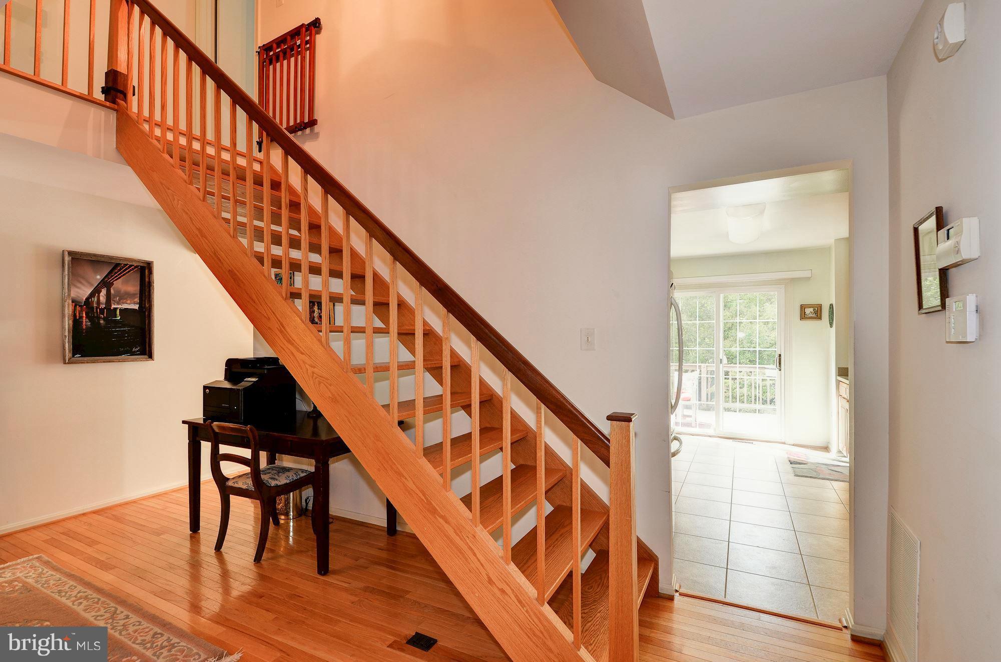1946 Flowering Tree Terrace Silver Spring, MD 20902 - Photo 6 of 30 Custom Built Wood Staircase