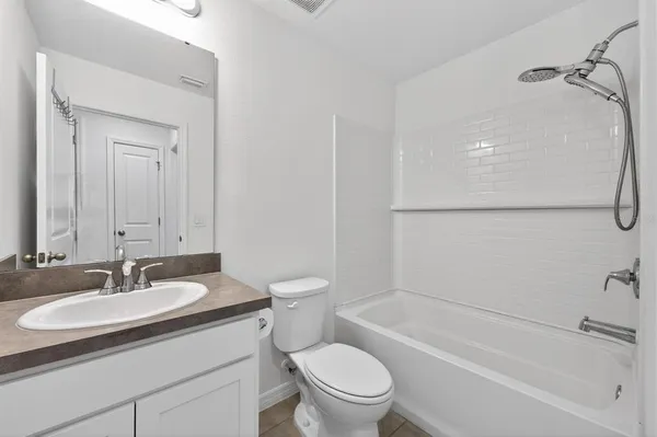 a view of a workspace with furniture