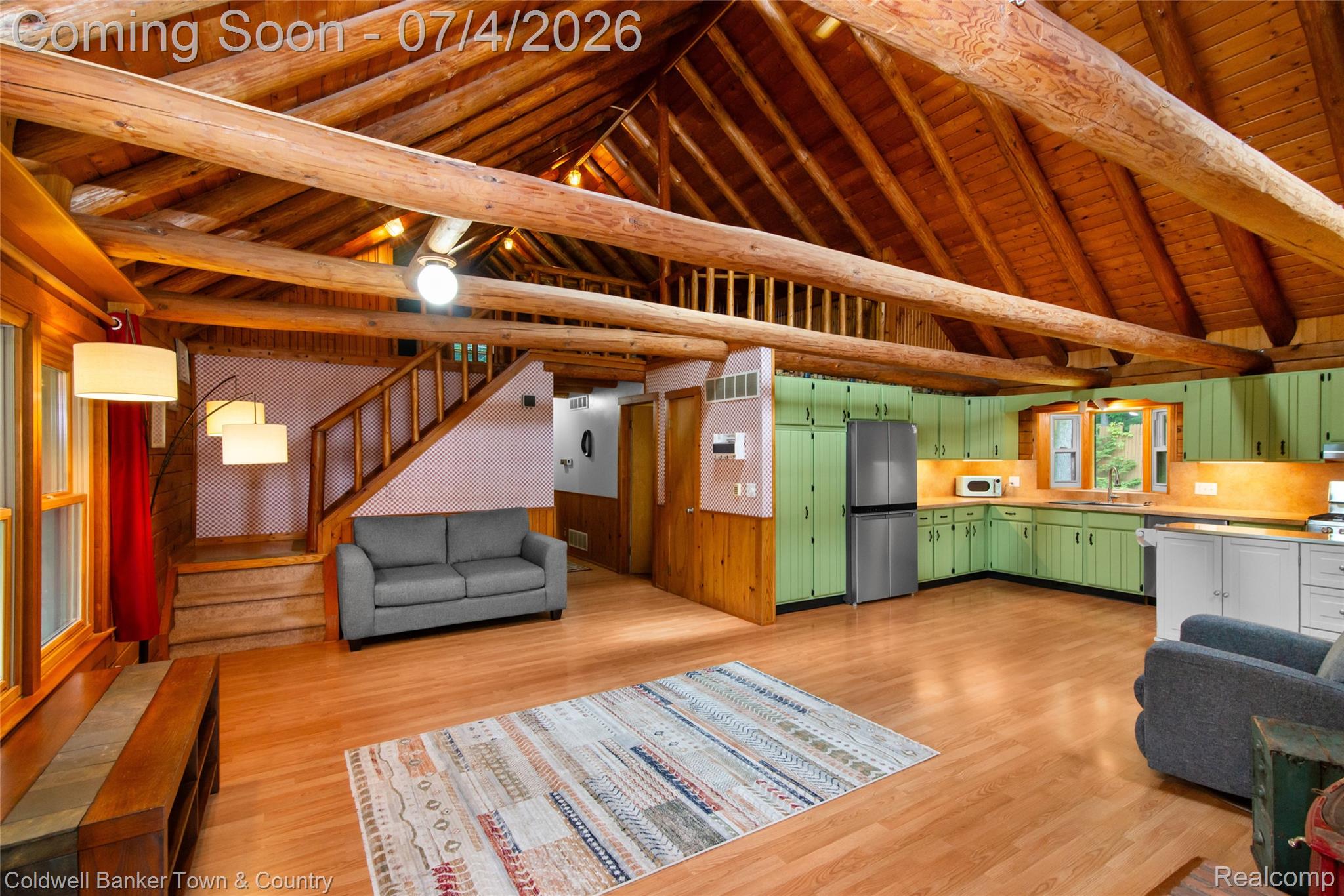 7335 Richardson Road Howell, MI 48843 - Photo 25 of 54 Vaulted wood-beam ceiling with wood-finish flooring