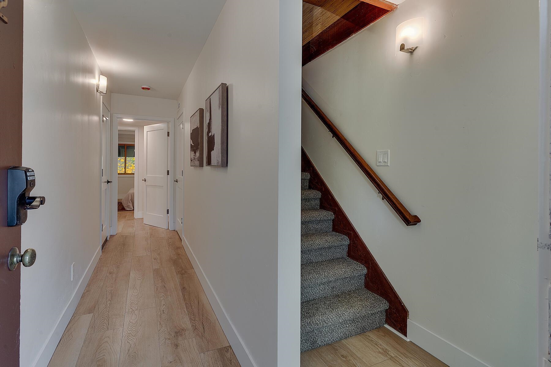 205 Alpine Meadows Road, Unit 2 Alpine Meadows, CA 96145 - Photo 15 of 28 a view of a hallway with stairs