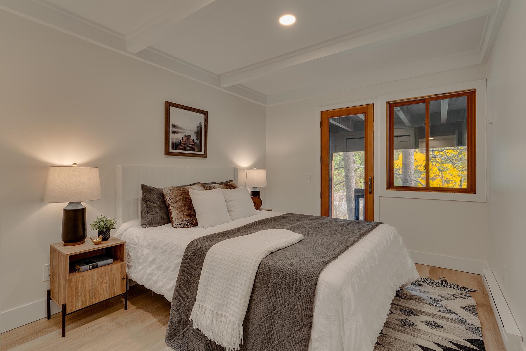 205 Alpine Meadows Road, Unit 2 Alpine Meadows, CA 96145 - Photo 18 of 28 a bedroom with bed and window