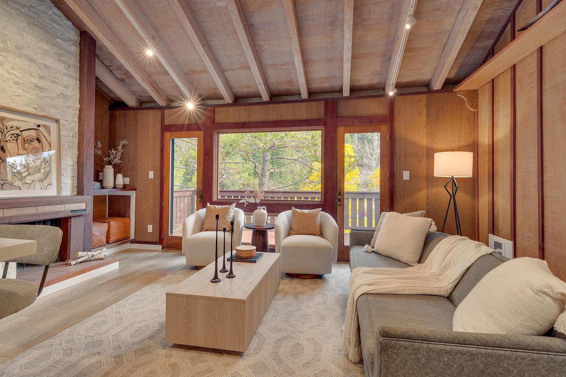 205 Alpine Meadows Road, Unit 2 Alpine Meadows, CA 96145 - Photo 3 of 28 a living room with furniture and a large window