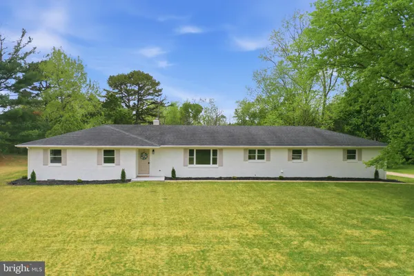 a house view with a garden space
