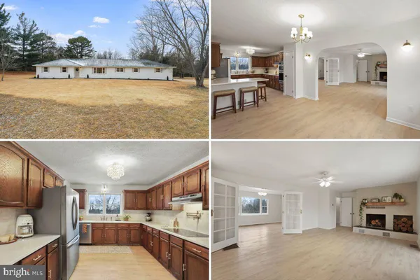 a view of a living room and kitchen