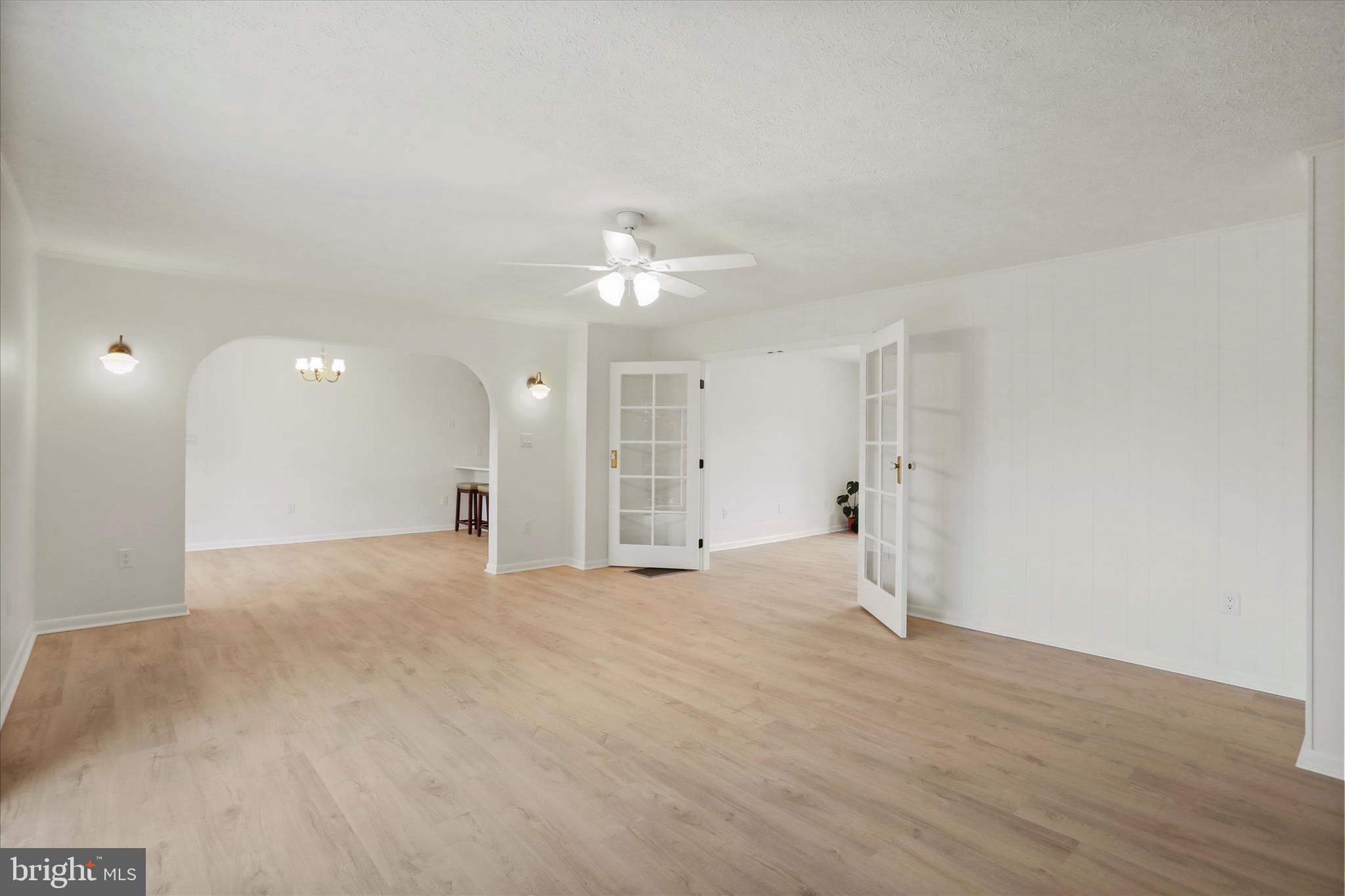 717 West Locust Street Woodstock, VA 22664 - Photo 21 of 71 a view of an empty room with wooden floor