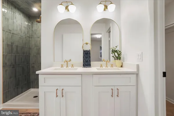 an empty room with windows and entrance