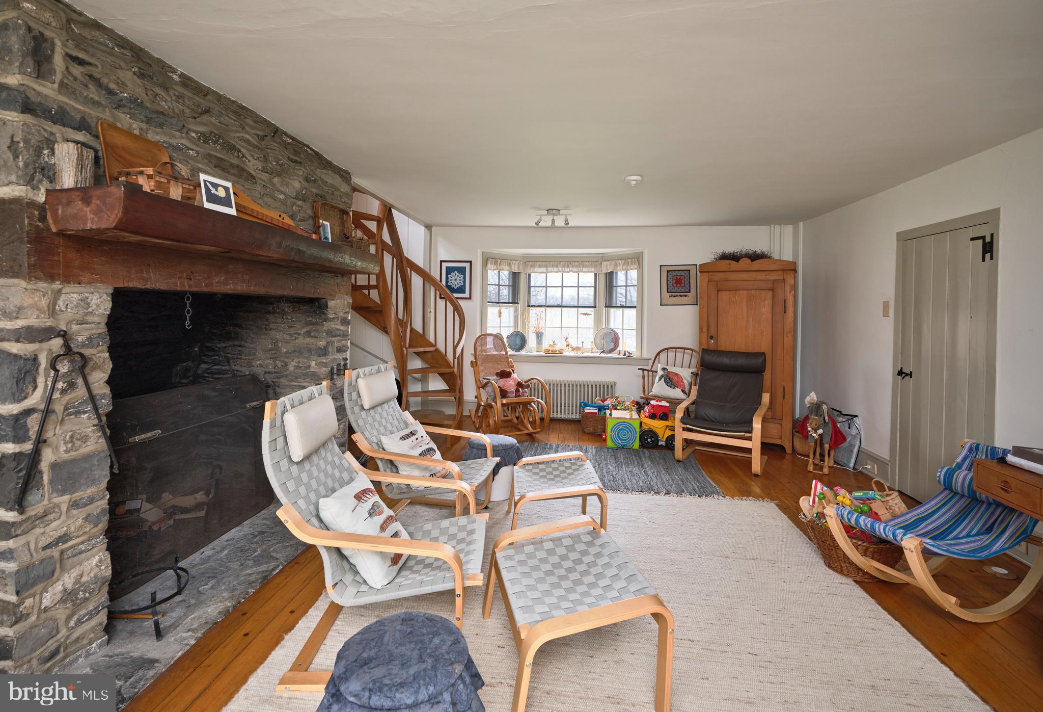 3837 Curly Hill Road Doylestown, PA 18902 - Photo 15 of 42 a living room with furniture a rug and a window