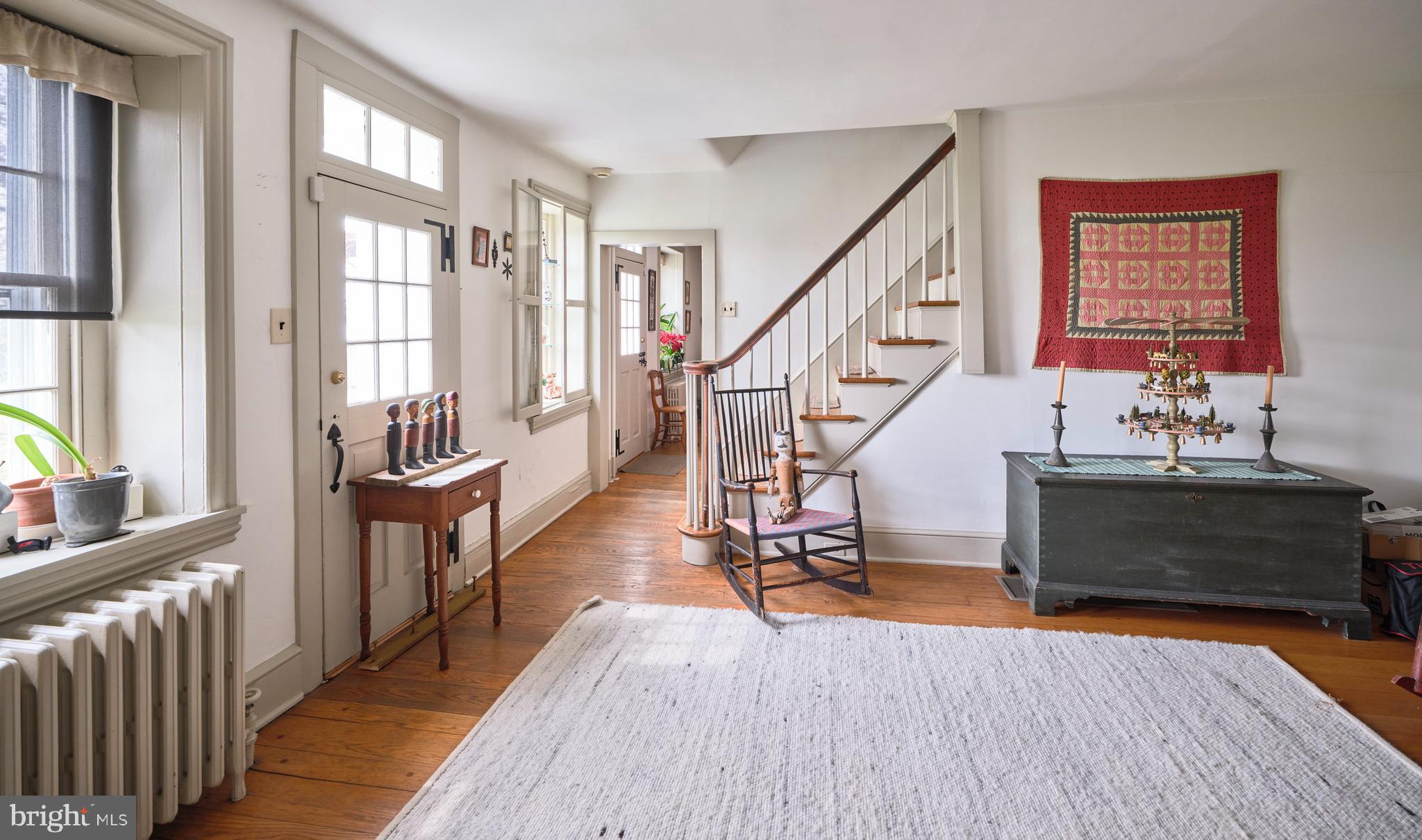 3837 Curly Hill Road Doylestown, PA 18902 - Photo 17 of 42 a view of an entryway with wooden floor and windows