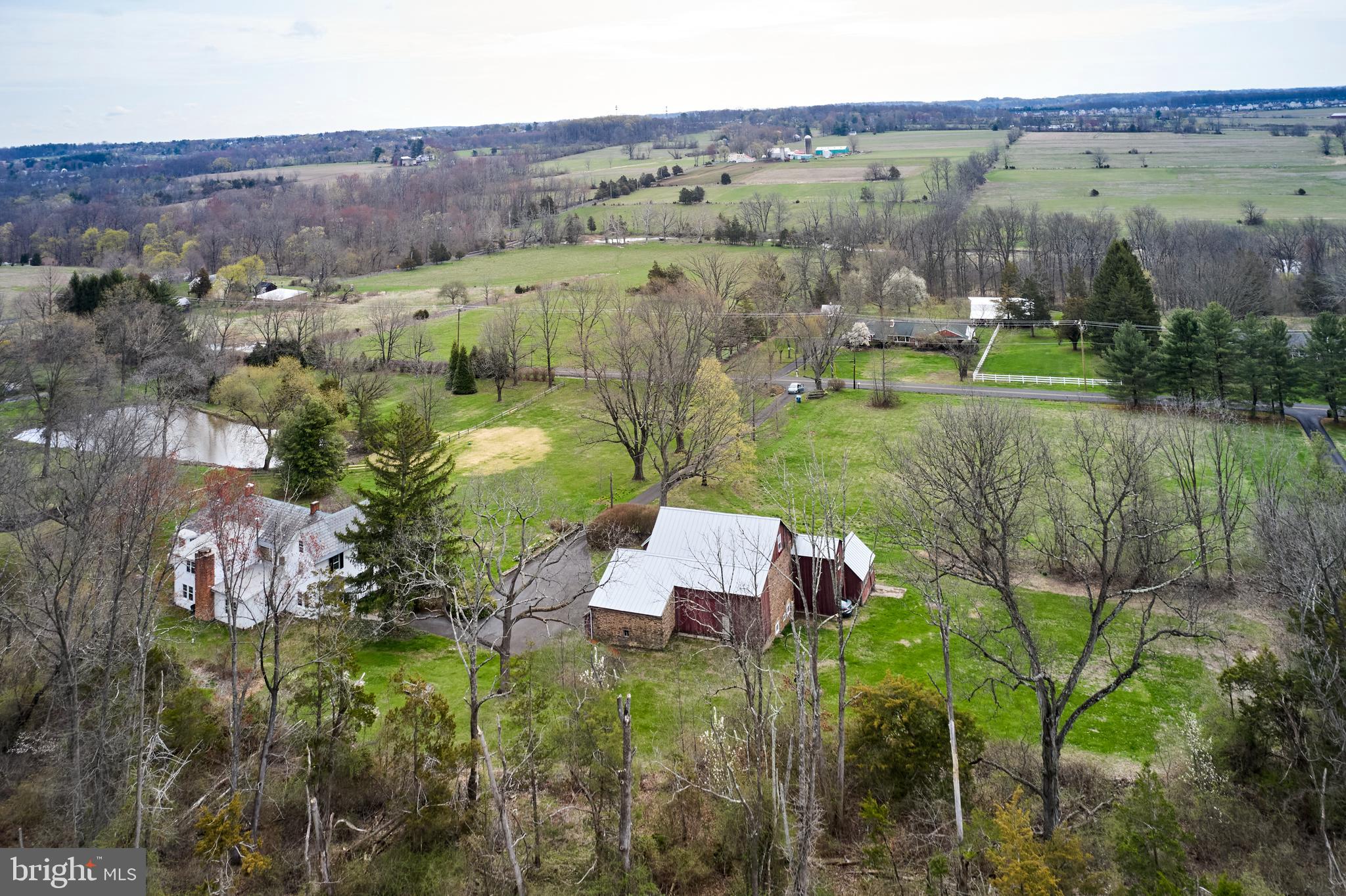 3837 Curly Hill Road Doylestown, PA 18902 - Photo 39 of 42 an aerial view of a house with a yard