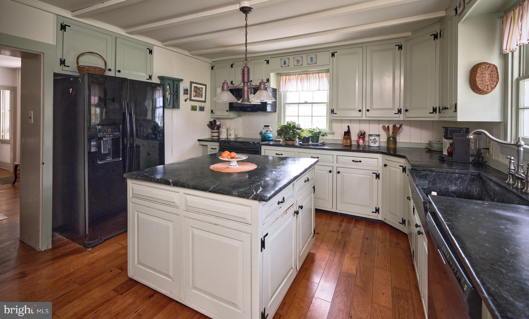 3837 Curly Hill Road Doylestown, PA 18902 - Photo 6 of 42 a kitchen with a sink stove and refrigerator