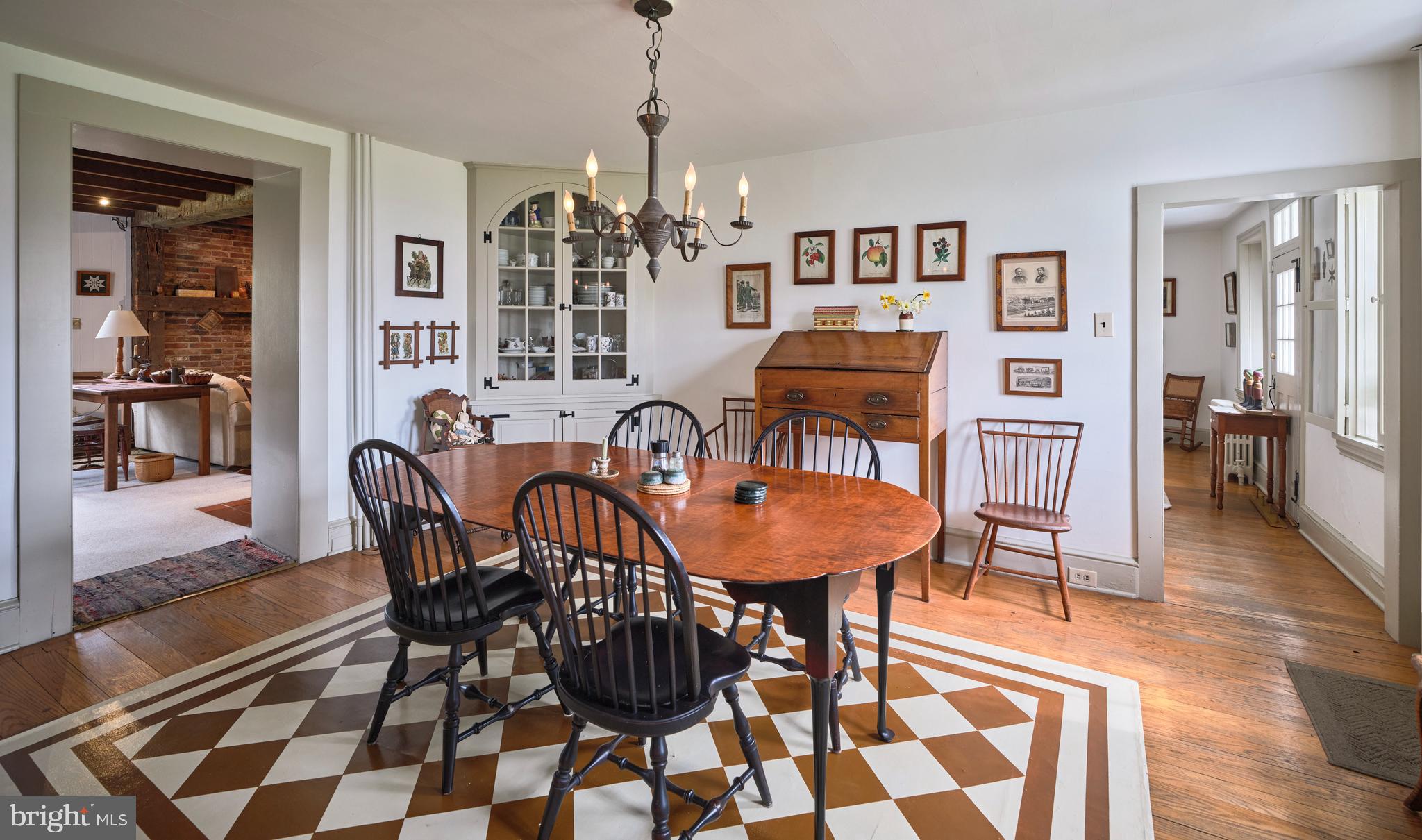 3837 Curly Hill Road Doylestown, PA 18902 - Photo 8 of 42 a view of a dining room with furniture and wooden floor