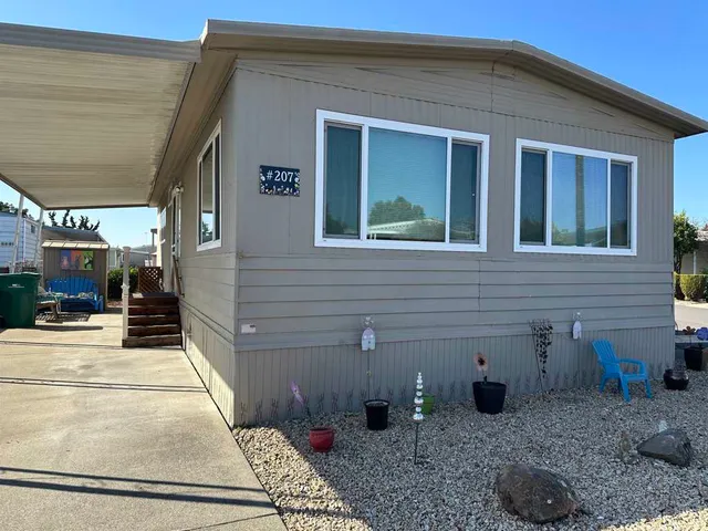 a view of a house with a patio