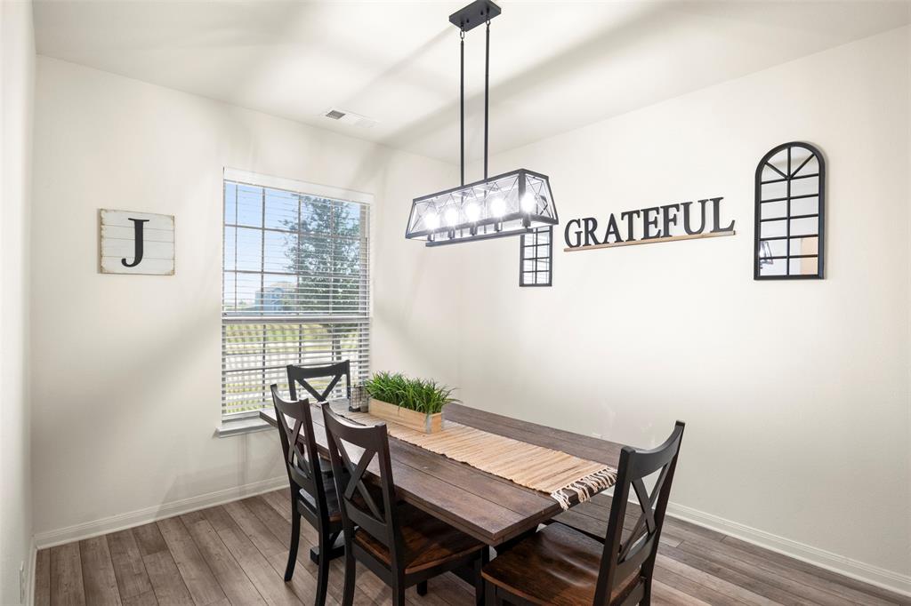 105 Patton Lane Venus, TX 76084 - Photo 13 of 29 Dining room with wood finished floors
