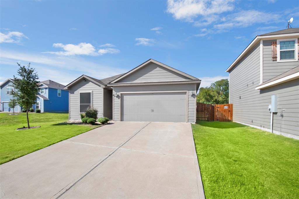 105 Patton Lane Venus, TX 76084 - Photo 2 of 29 Ranch-style house with a garage and driveway