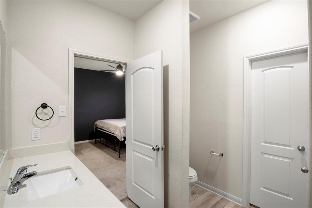105 Patton Lane Venus, TX 76084 - Photo 18 of 29 Bathroom featuring connected bathroom and vanity