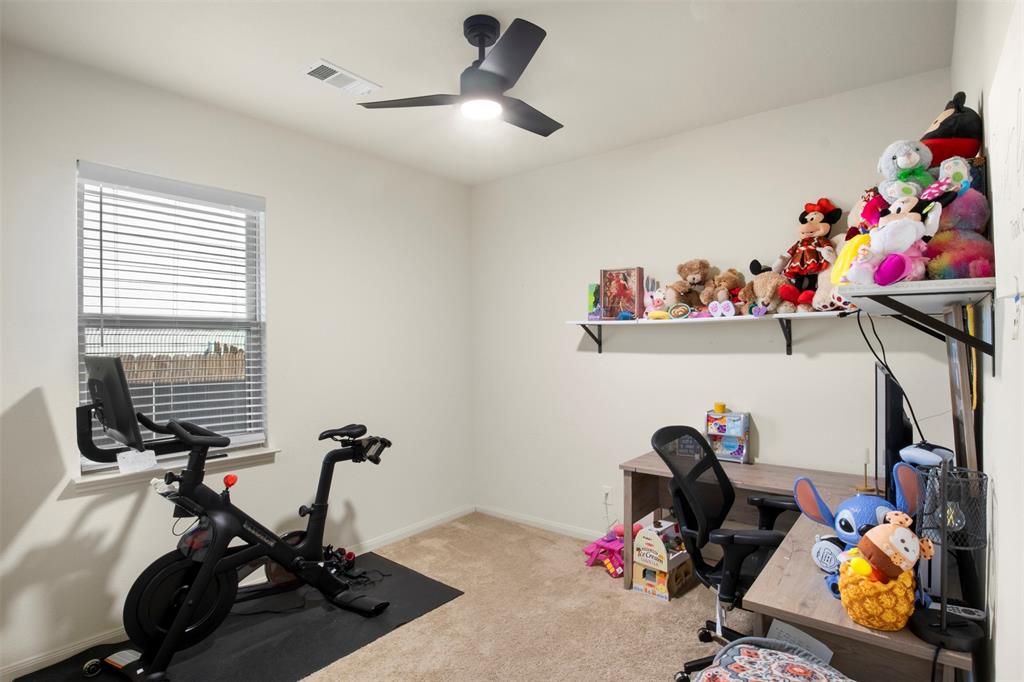 105 Patton Lane Venus, TX 76084 - Photo 21 of 29 Workout room featuring light colored carpet and a ceiling fan
