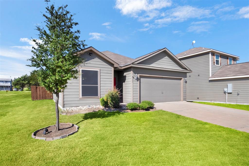 105 Patton Lane Venus, TX 76084 - Photo 3 of 29 View of front of home featuring concrete driveway and an attached garage