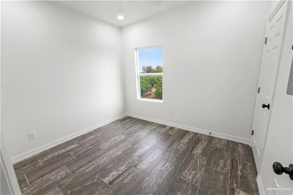 a view of a room that has a window in it