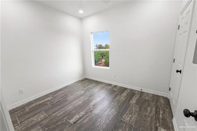 a view of a room that has a window in it