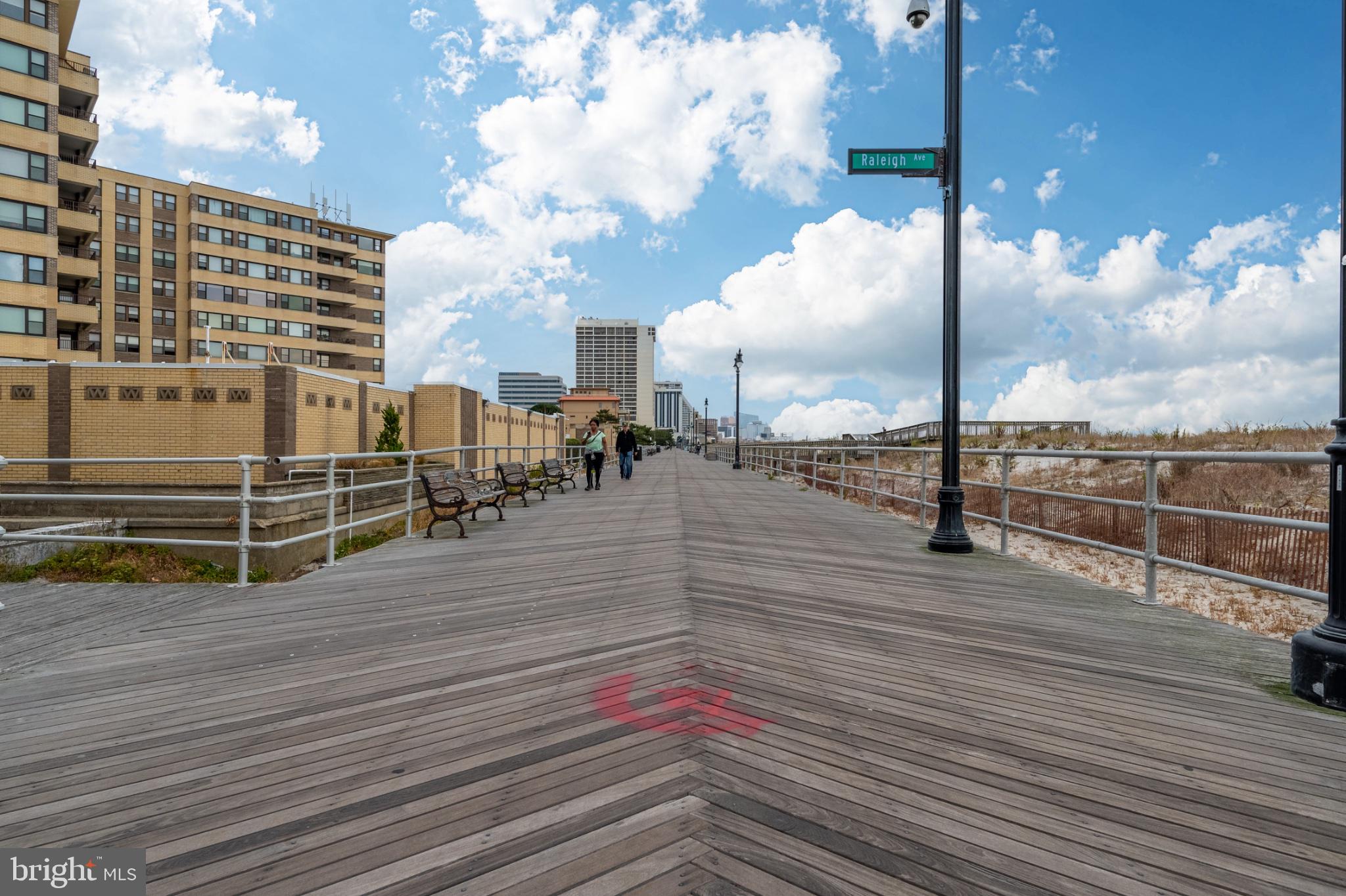 101 South Raleigh Avenue Atlantic City, NJ 08401 - Photo 23 of 26 Scenic boardwalk under blue skies.