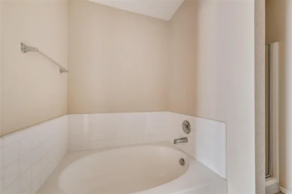 a bathroom with a bathtub